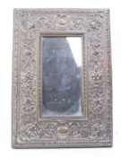 EARLY 20TH CENTURY ART NOUVEAU BRASS MIRROR