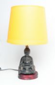 1950S JAPAN COPPER BUDDHA BASED LAMP WITH YELLOW SHADE