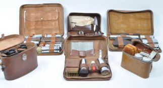 COLLECTION OF SEVEN GENTLMEN'S TRAVELLING VANITY SETS