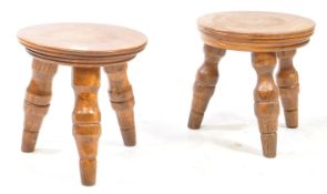 TWO VINTAGE 20TH CENTURY ELM WOOD LOW MILKING STOOLS