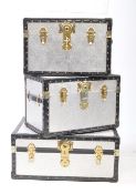 COLLECTION OF THREE MODERN SILVER ALUMINIUM METAL TRUNKS