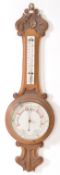 VINTAGE 20TH CENTURY CARVED OAK ANEROID BAROMETER