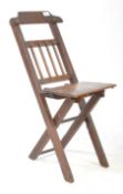 EARLY 20TH CENTURY OAK FOLDING CHAIR