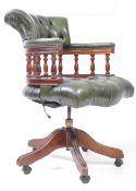 EARLY 20TH CENTURY GREEN LEATHER BUTTON BACK CAPTAINS CHAIR