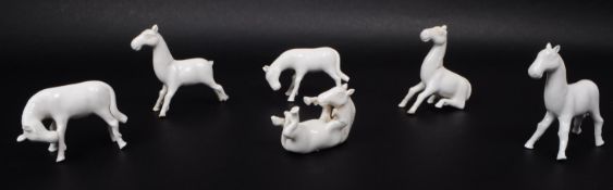 BLANC DE CHINE - SIX CHINESE 20TH CENTURY WHITE PORCELAIN HORSE FIGURES