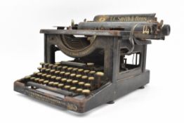 EARLY 20TH CENTURY AMERICAN CAST IRON FRAMED VINTAGE TYPEWRITER BY L. C. SMITH & BROS