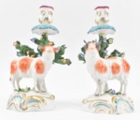PARIS PORCELAIN - PAIR OF 19TH CENTURY SAMSON RAM AND EWE PORCELAIN CANDLESTICKS
