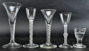 FIVE 18TH C & LATER DRINKING GLASSES, FOUR FEATURING TWIST STEMS