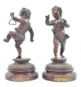 AFTER E. H. DUMAIGE - LATE 19TH CENTURY PAIR OF SPELTER DANCING CHERUBS