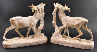 PAIR OF VICTORIAN 19TH CENTURY PARIAN WARE GRAZING STAGS