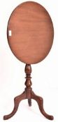 A 19TH CENTURY MAHOGANY TILT TOP PEDESTAL TRIPOD SIDE / WINE TABLE
