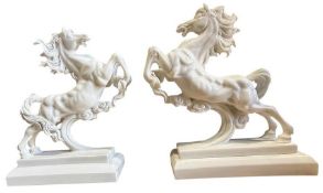 PAIR OF CONTEMPORARY CARVED POLISHED WHITE MARBLE RAMPANT HORSES