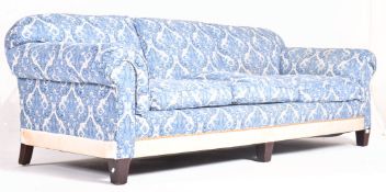 LATE 19TH / EARLY 20TH CENTURY REUPHOLSTERED THREE SEATER SOFA