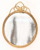 19TH CENTURY OVAL GILT FRAMED MIRROR