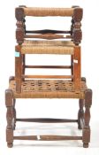 GROUP THREE 20TH CENTURY RATTAN FOOTSTOOLS