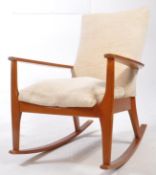 PARKER KNOLL - MID 20TH CENTURY TEAK ROCKING ARMCHAIR