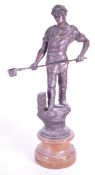 EARLY 20TH CENTURY BRONZED SPELTER BLACKSMITH FIGURE 'LE FONDEUR'