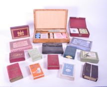COLLECTION OF 20TH CENTURY PLAYING CARDS AND POKER SET