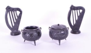 COLLECTION OF FOUR 20TH CENTURY IRISH CARVED EBONY FIGURES