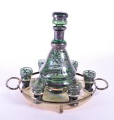 LATE 20TH CENTURY WHITE METAL AND GREEN GLASS DECANTER SET