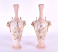 RUDOLSTADT - TWO EARLY 20TH CENTURY TWIN HANDLED PORCELAIN VASES