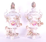 A PAIR OF 19TH CENTURY CONTINENTAL POTPOURRI LIDDED VASES