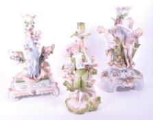 COLLECTION OF GERMAN PORCELAIN CANDLESTICK HOLDERS