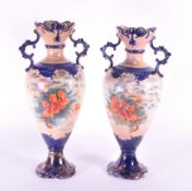 PAIR OF LATE 19TH CENTURY CONTINENTAL CERAMIC TWIN HANDLED VASES