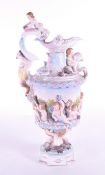 19TH CENTURY CONTINENTAL PORCELAIN EWER DECORATED WITH CHERUBS