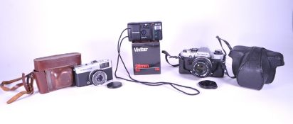 THREE LATE 20TH CENTURY OLYMPUS FILM CAMERAS & LENS