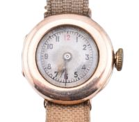 9CT GOLD EARLY 20TH CENTURY SERVICES CANVAS STRAP WRISTWATCH