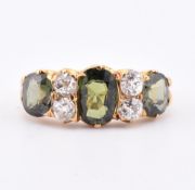 GOLD GREEN STONE & DIAMOND THREE STONE RING