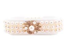 THREE STRAND PEARL BRACELET WITH A HALLMARKED 9CT GOLD CLASP