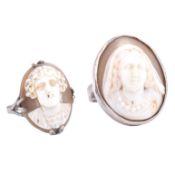TWO WHITE METAL CARVED SHELL CAMEO RINGS
