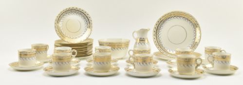 19TH CENTURY REGENCY STYLE PORCELAIN GILT & BLUE PART TEA SERVICE