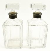 PAIR OF 20TH CENTURY 925 SILVER COLLARED CUT GLASS DECANTERS