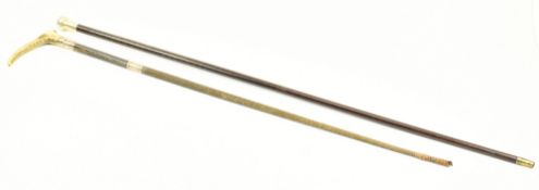 TWO HALLMARKED SILVER TOPPED WALKING STICKS