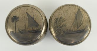 A PAIR OF 20TH CENTURY IRAQI SILVER NIELLO TEA CADDIES