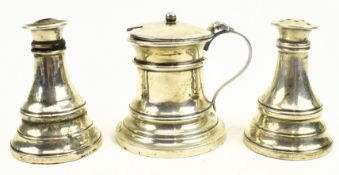 A GEORGE V THREE-PIECE BLUE GLASS LINED HALLMARK SILVER CONDIMENT SET