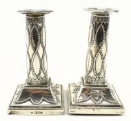 PAIR OF EDWARD VII HALLMARKED SILVER CANDLESTICKS