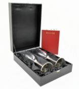 A CASED PAIR OF 21ST CENTURY SILVER MOUNTED GLASS CHAMPAGNE FLUTES
