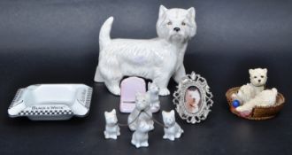 COLLECTION OF WHITE SCOTTY AND TERRIER DOG FIGURES