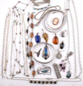 A collection of silver and white metal jewellery to include amber set, Art nouveau enamelled