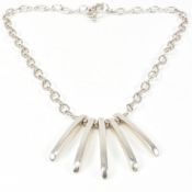 A hallmarked silver fringe necklace with toggle clasp. The cable link chain having five silver bar