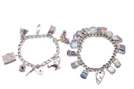 TWO HALLMARKED SILVER CHARM BRACELETS