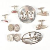 Three pairs of hallmarked silver cufflinks and brooch pins. The lot to include a pair of