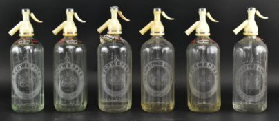 SCHWEPPES - CRATE OF SIX GLASS SODA SYPHONS