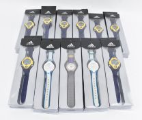 ADIDAS - COLLECTION OF ELEVEN VINTAGE BOXED WRISTWATCHES