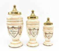 SET OF THREE GRADUATING DELFT PORCELAIN PHARMACEUTICAL LIDDED JARS