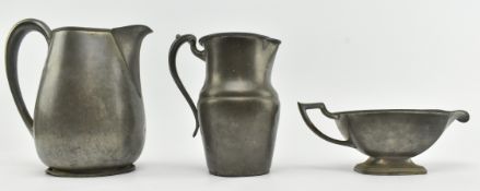THREE EARLY T MID 20TH CENTURY PEWTER PITCHERS & GRAVY BOAT